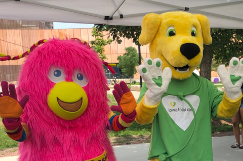 photo of Rosie the Reader mascot and Doc the Dog mascot