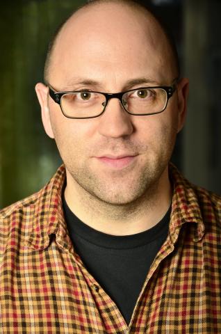 a headshot of Daniel Kraus, an author
