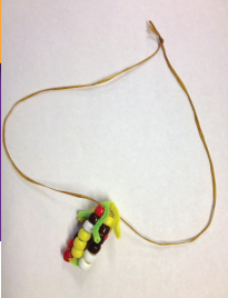 Corn necklace made from pipe cleaners and pony beads.