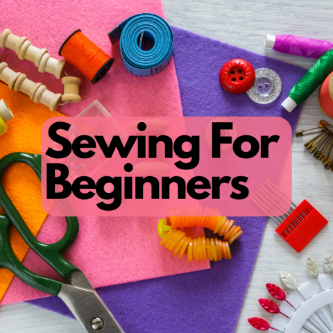 sewing supplies on a table with the event title