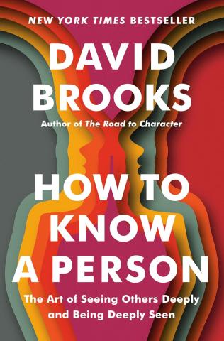 Book cover with the profiles of two faces facing each other and multiple layers to each face.